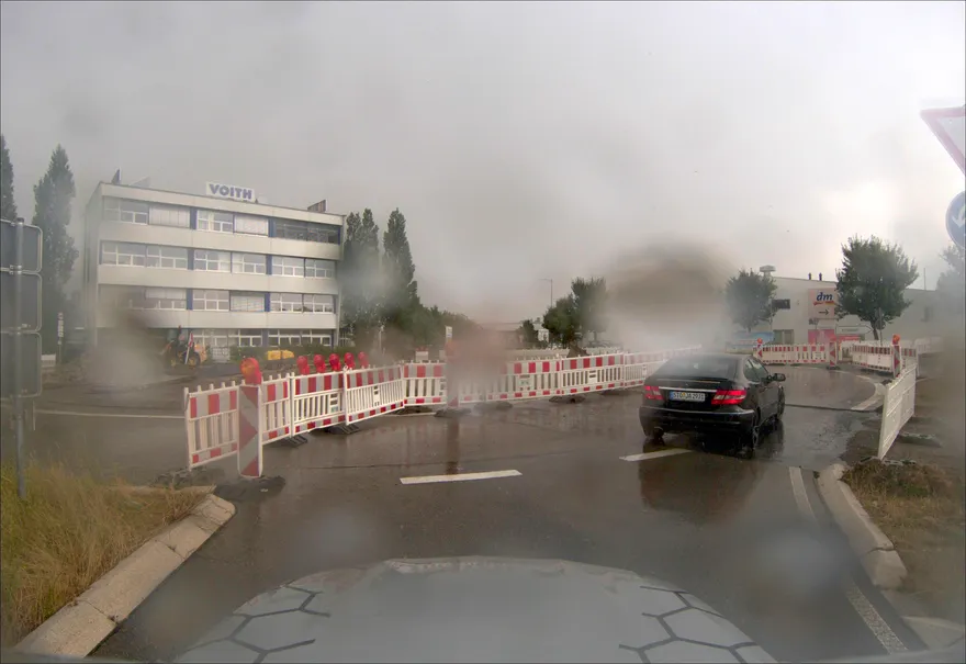 Heavy rain and construction scene from the KITScenes dataset